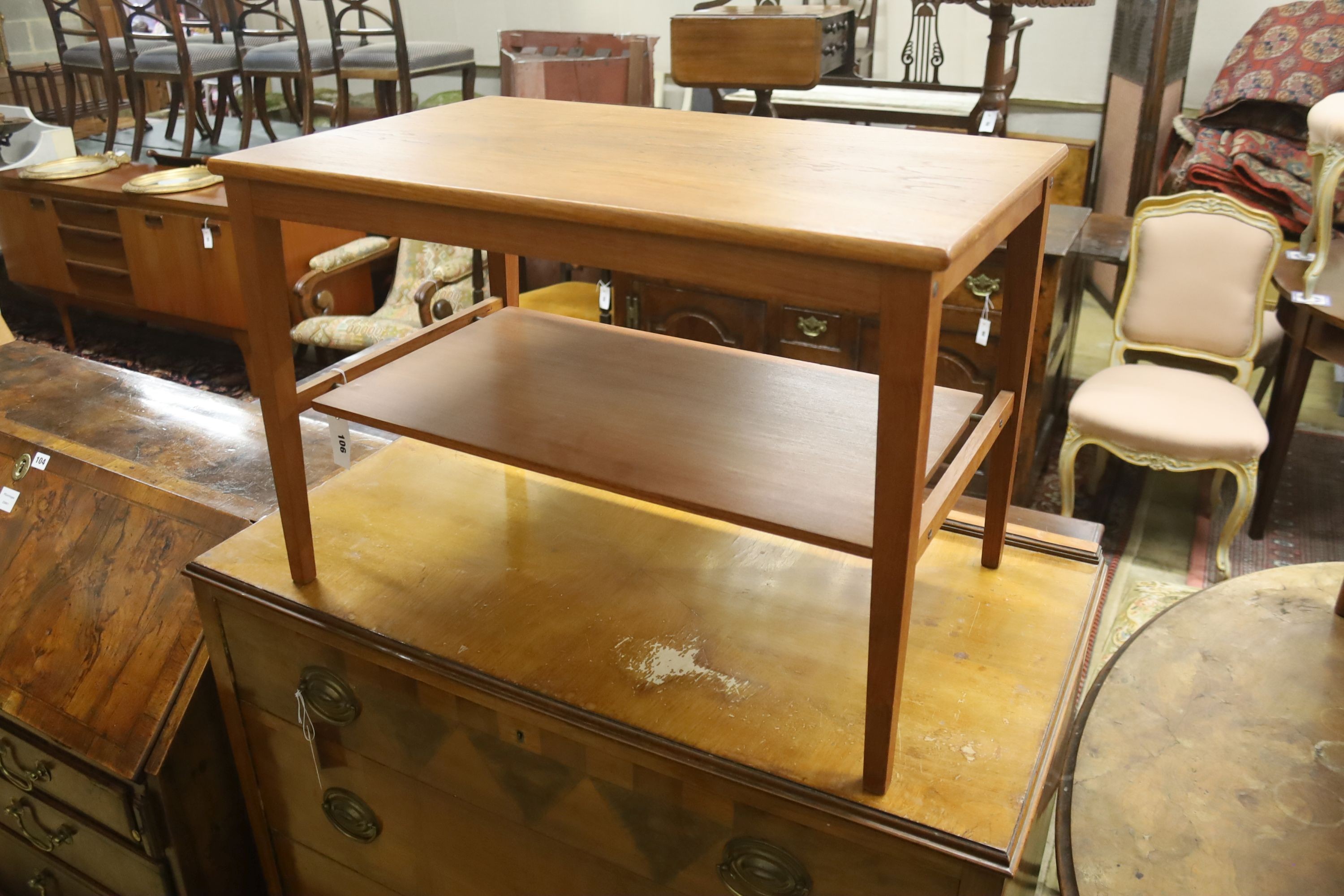 A mid century design Danish style teak two-tier occasional table, width 68cm, depth 43cm, height 45cm